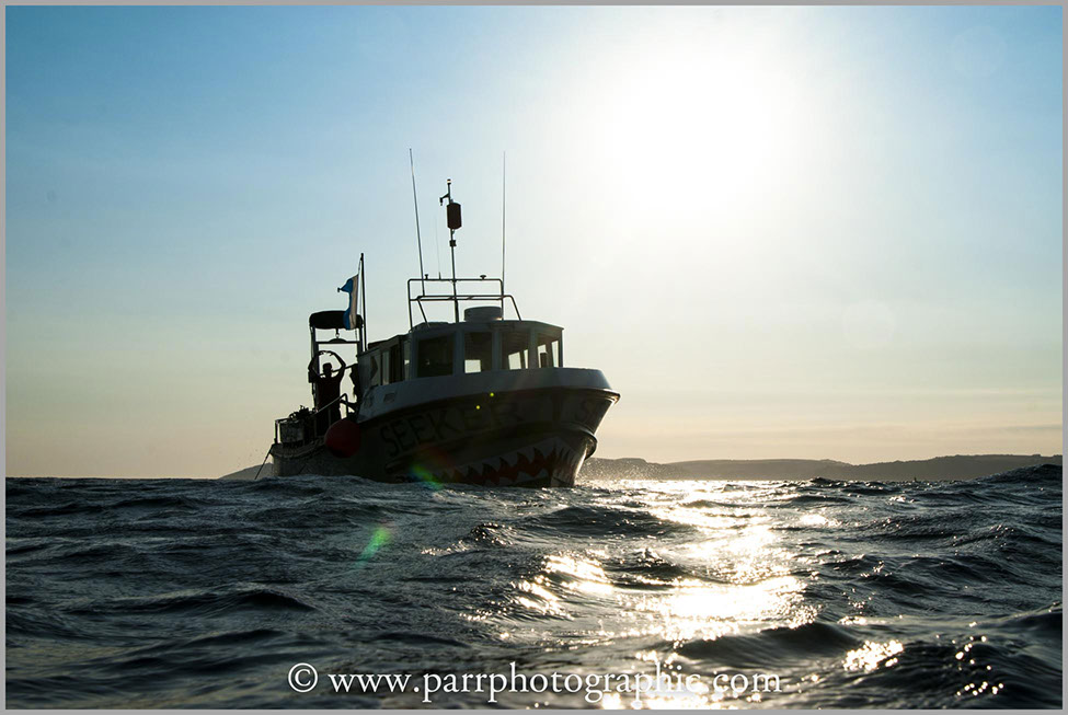 Indeep's boat coming in to pick up a diver. Image used for the web site.